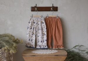 Puella Flo Allover Print Lace-Hem Pants